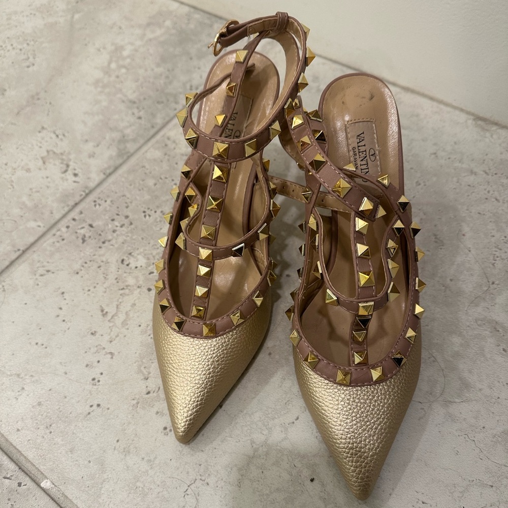 Gold metallic studded heels